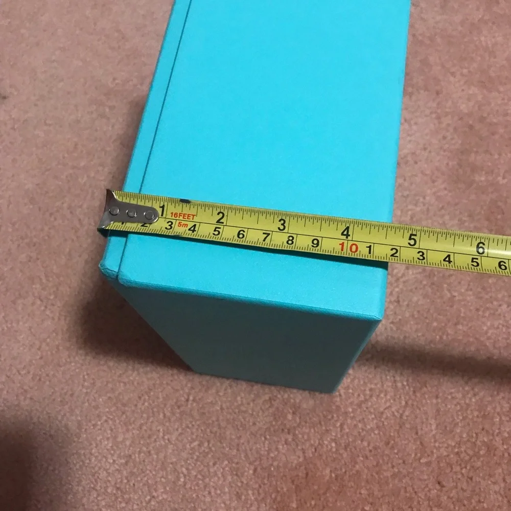 Tiffany box in very good condition plus a small bag of